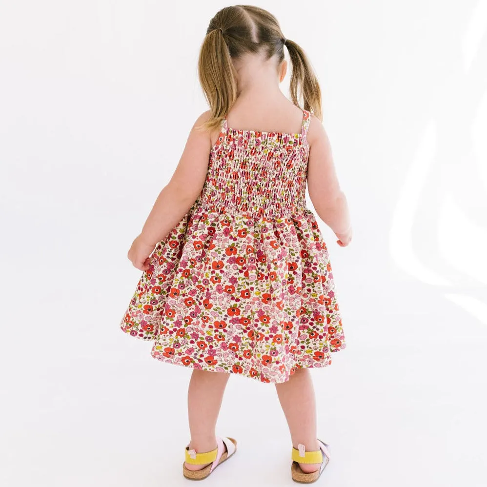 The Baby Smocked Dress in Poppy Floral